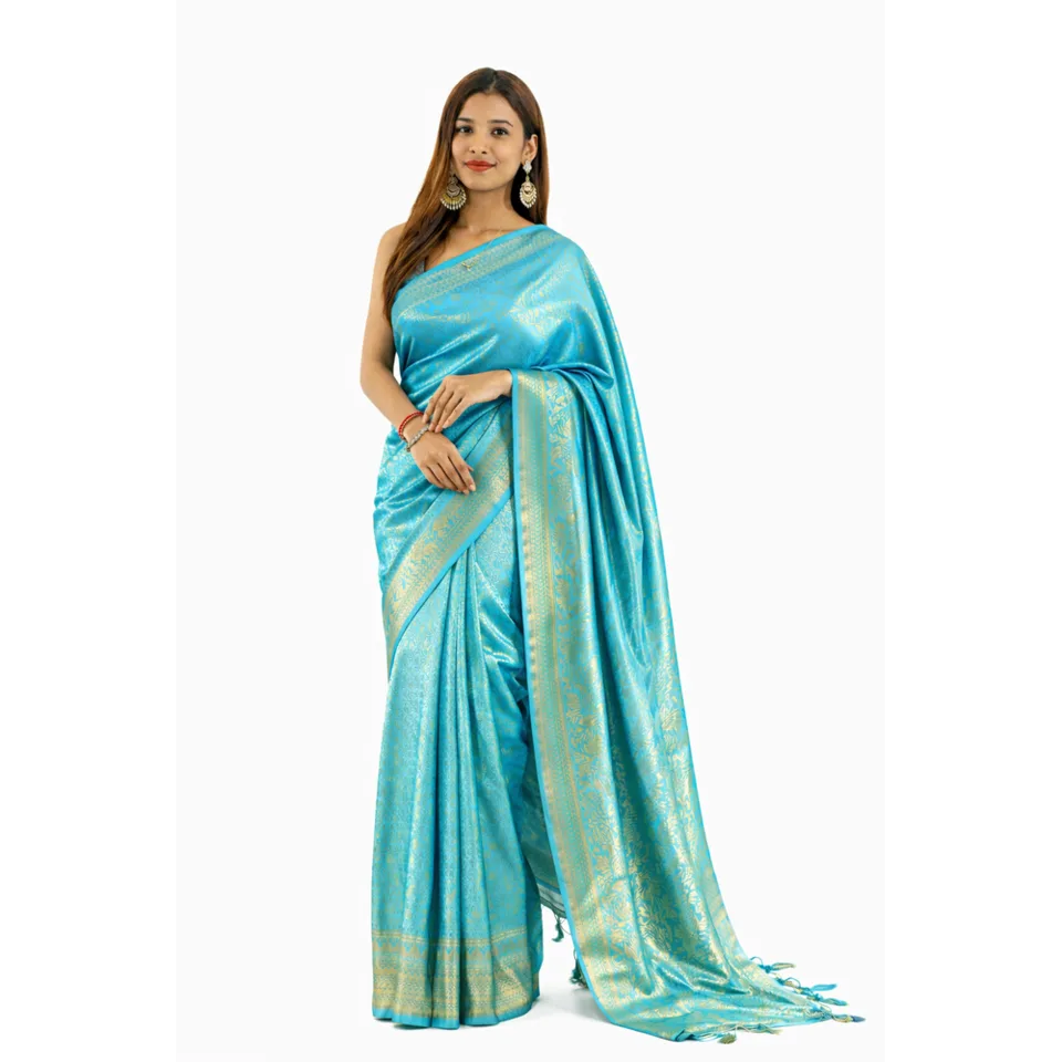 Neelam Breeze — Turquoise silk saree